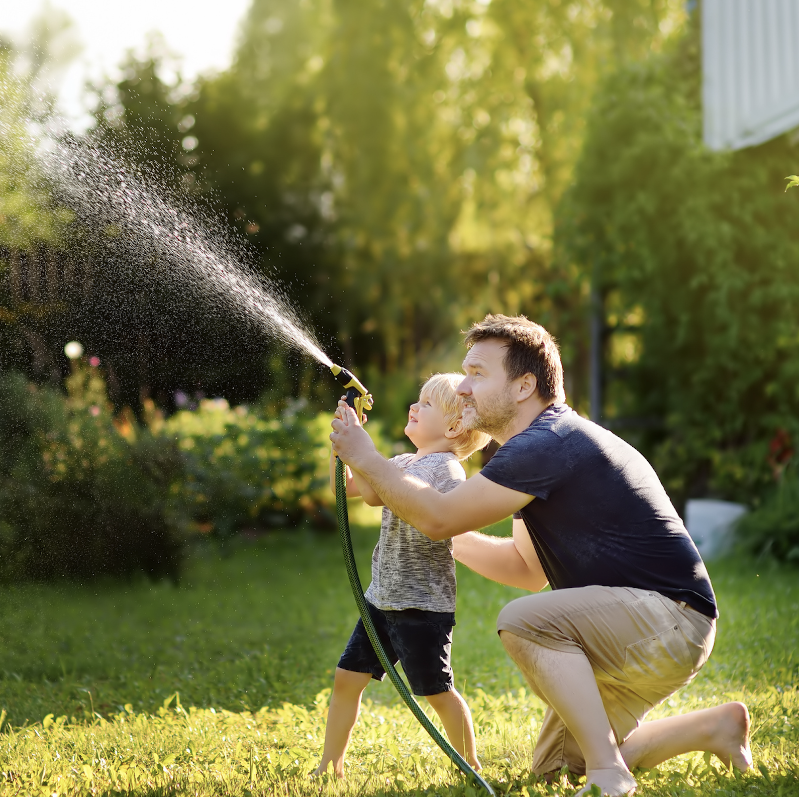 dad_and_toddler_with_hose