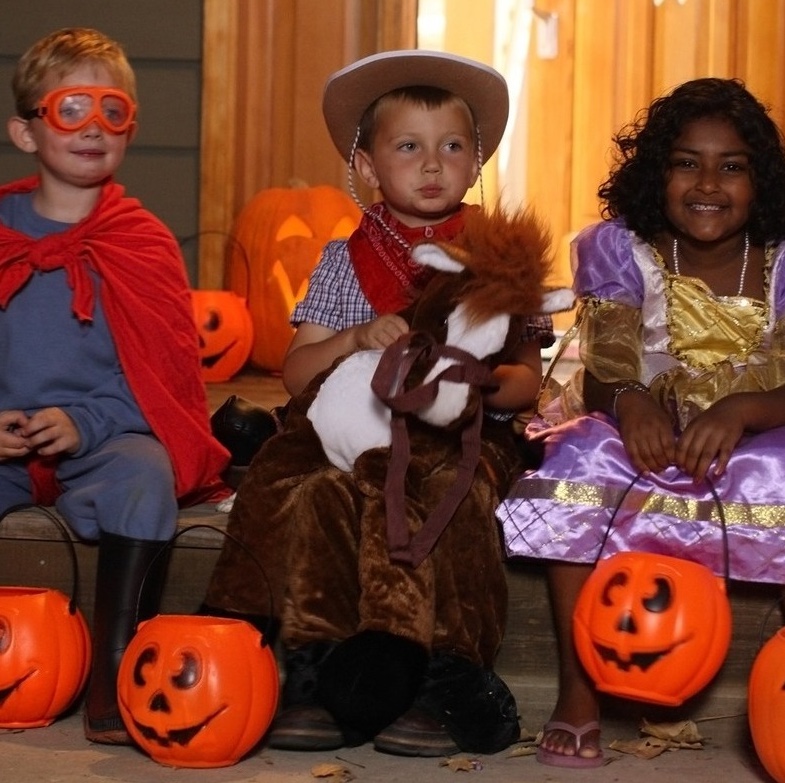 Group of kids in Halloween costumes