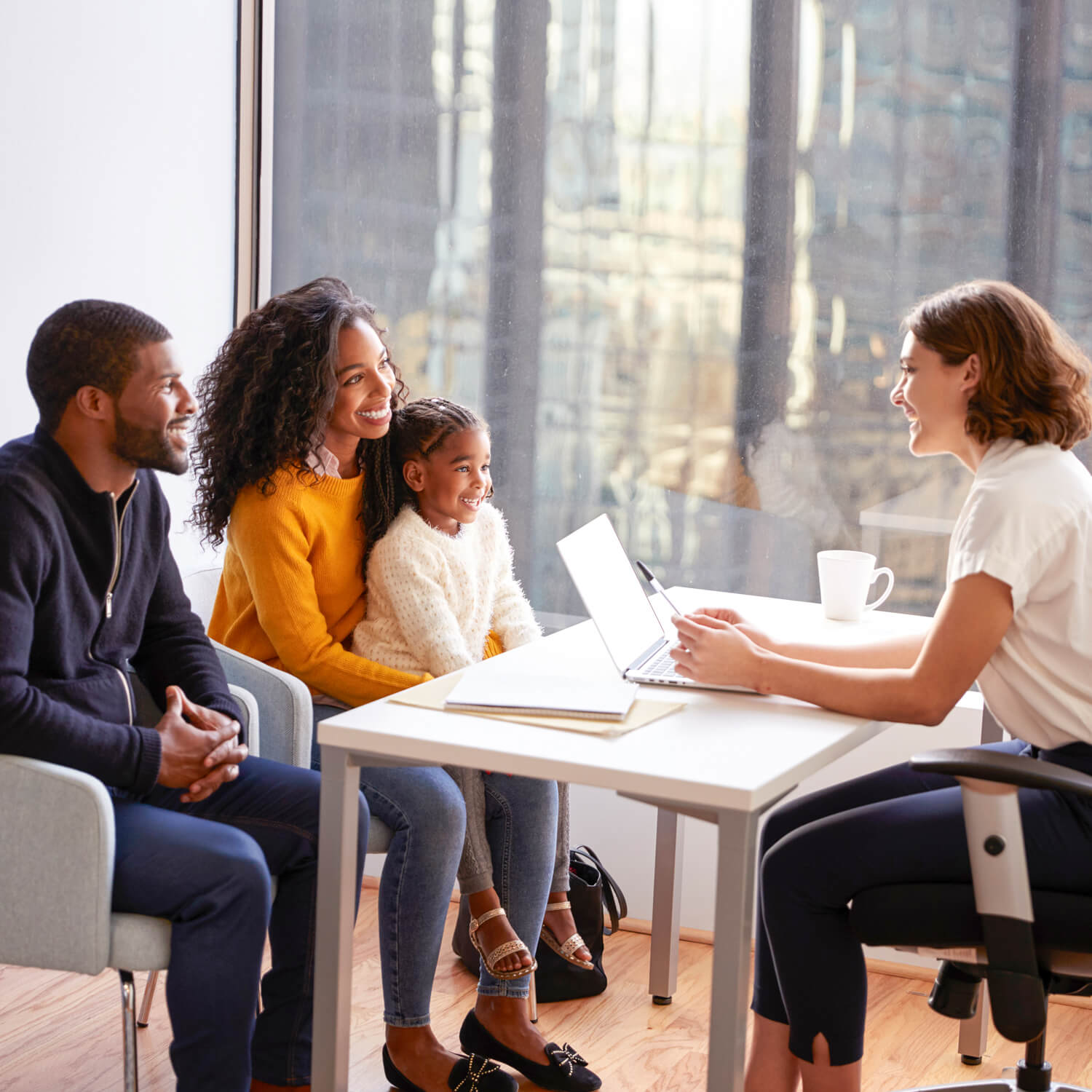 Family_Having_Consultation_With_Female_Pediatrician